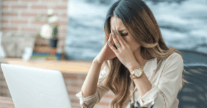stressed woman on a laptop