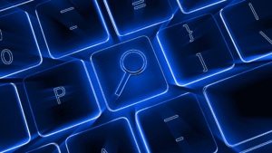 keyboard with a magnifying glass representing seo